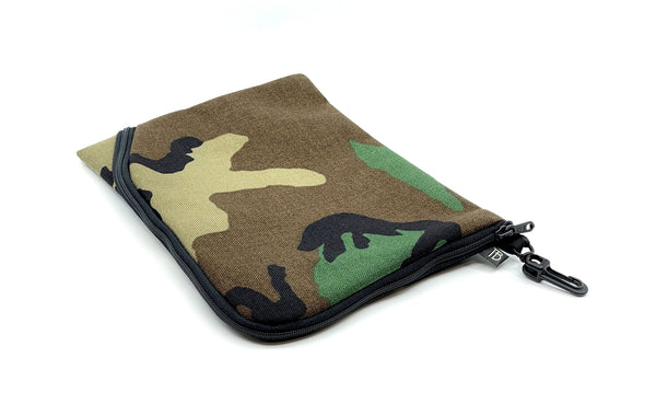An A5 Ghost Whale Pouch in Beaver Camo (green, brown, tan and black camoflauge pattern).